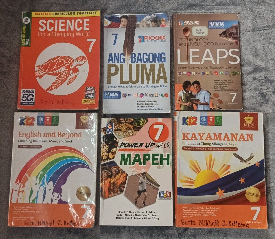 Grade 7 books - used last school year (Category: Textbooks) located in Quezon City. Submitted by raid.my.closet. (Listing ID 1445617506, Image 1). Description: Have plastic cover. Some pages have answers. Well taken care of. Pluma - ❌.