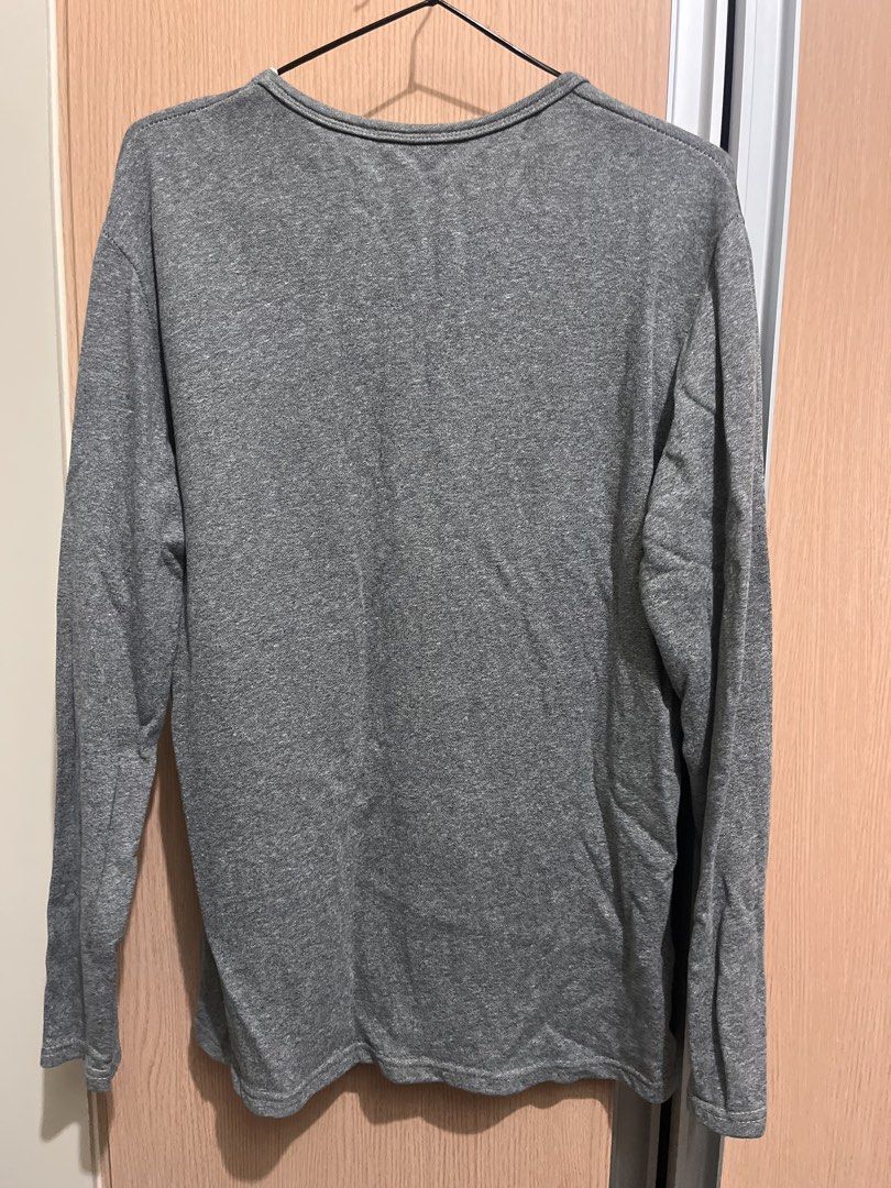 Grey Long Sleeved Shirt / Sweatshirt (Category: Coats, Jackets and Outerwear) located in Quezon City. Submitted by thiftwme (Listing ID 1445781414, Image 2). Description: - Grey long sleeved shirt - Best fits S-M male M-L female - Ideal for casual wear.