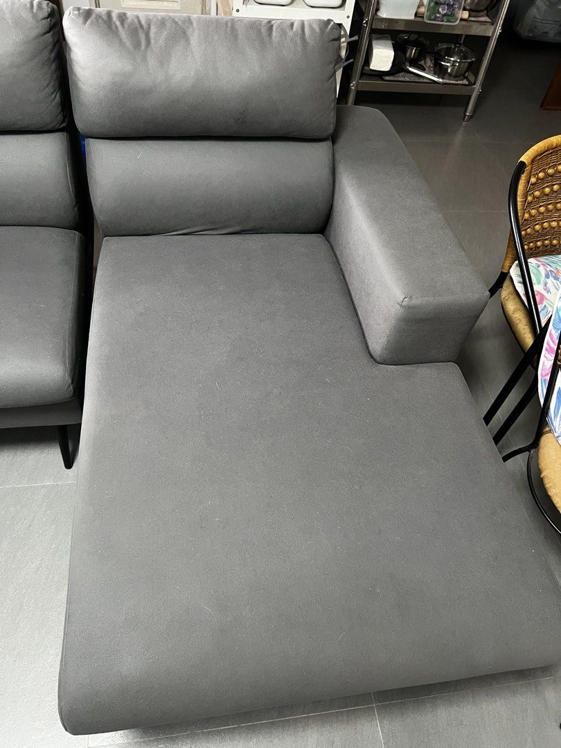 Grey L-Shaped Sectional Sofa (Category: Sofas) located in Cavite. Submitted by maddie_12 (Listing ID 1445690323, Image 3). Description: - Comfy grey L-shaped sectional sofa - Adjustable headrests for extra comfort - Soft, touchable fabric - Slim black legs - Ideal for lounging and entertaining - Fits most living spaces - Easy to clean.