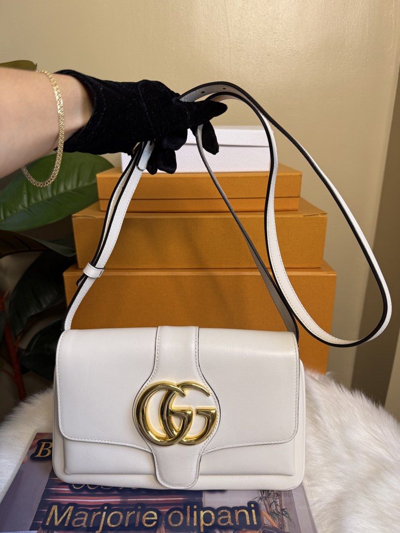 Gucci Marmont White Leather Shoulder Bag (Category: Luxury Bags & Wallets) located in Caloocan City. Submitted by marj_bags (Listing ID 1445646131, Image 1). Description: - Authentic white leather Gucci Marmont shoulder bag - Iconic gold GG logo hardware - Adjustable strap for versatile wear - Pristine interior condition - Comes with original dust bag - Ideal for both daily use and special events.
