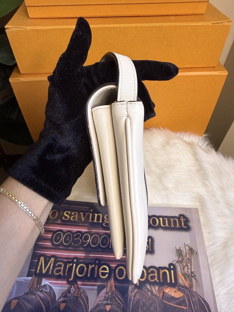 Gucci Marmont White Leather Shoulder Bag (Category: Luxury Bags & Wallets) located in Caloocan City. Submitted by marj_bags (Listing ID 1445646131, Image 3). Description: - Authentic white leather Gucci Marmont shoulder bag - Iconic gold GG logo hardware - Adjustable strap for versatile wear - Pristine interior condition - Comes with original dust bag - Ideal for both daily use and special events.