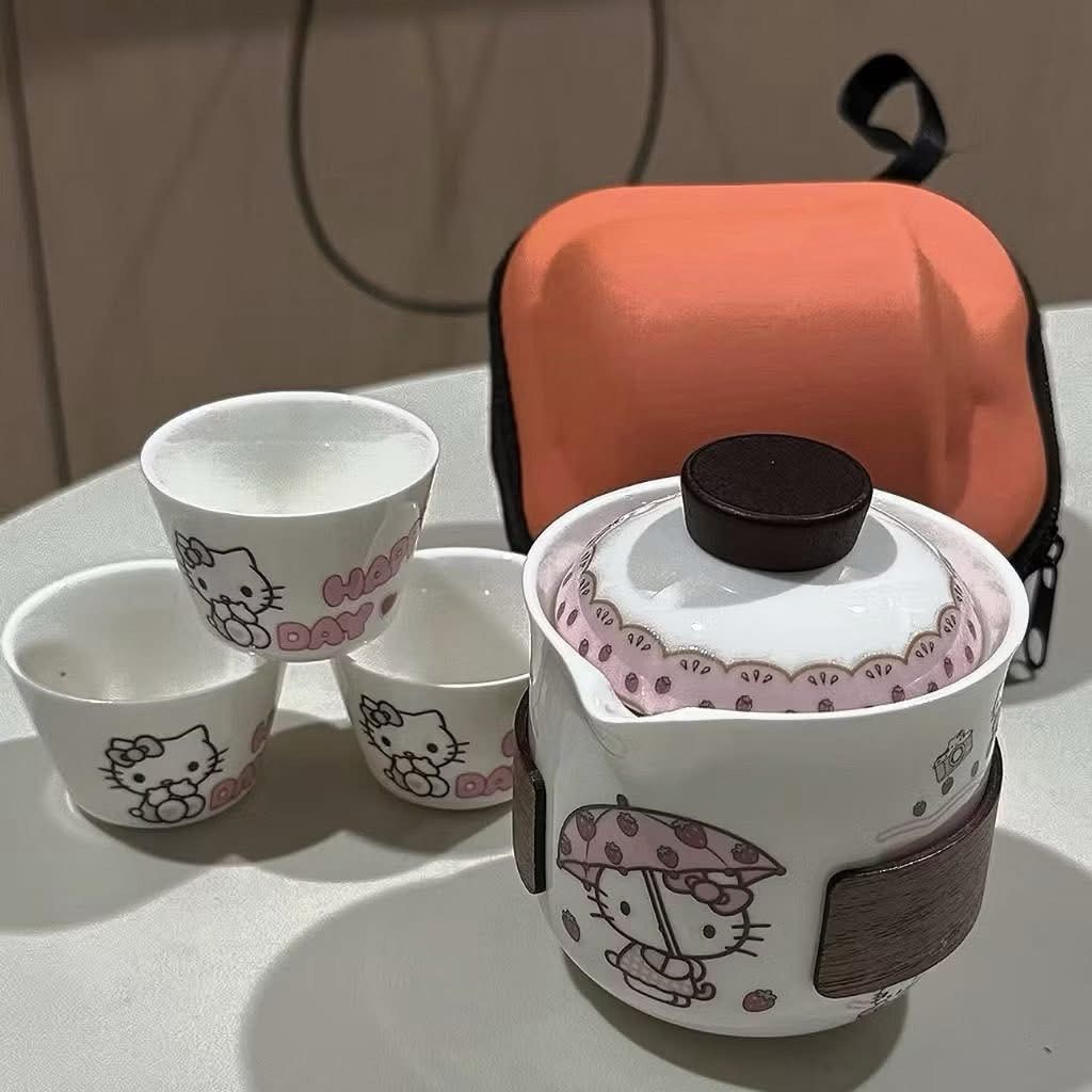Hello Kitty ceramic tea set with case (Category: Coffee & Tea Tableware) located in Quezon City. Submitted by unicornmanila (Listing ID 1445747917, Image 2). Description: 🦄 Hello Kitty ceramic tea set with case 🦄 Preorder - ETA 3-4 weeks only 🦄 50% down payment only.