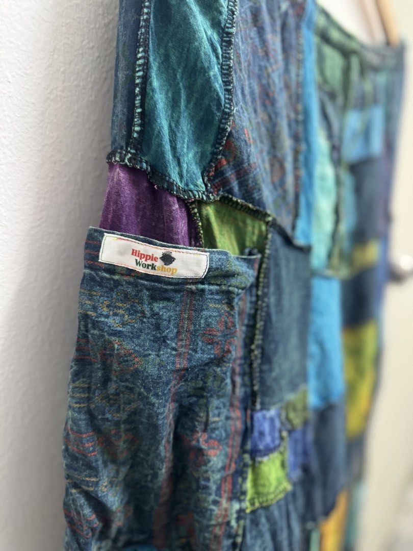 Hippie Workshop Patchwork Pants (Category: Skirts) located in Kuala Lumpur. Submitted by lubukrezeki_ (Listing ID 1445636627, Image 2). Description: - Patchwork Pants from Hippie Workshop. - Unique mix of blues, greens, purples, and red fabric accents. (Ocean Lover) - Features convenient front pockets. - Ideal for festival vibes or everyday casual style. -Fit to S to 2XL (Free Size).