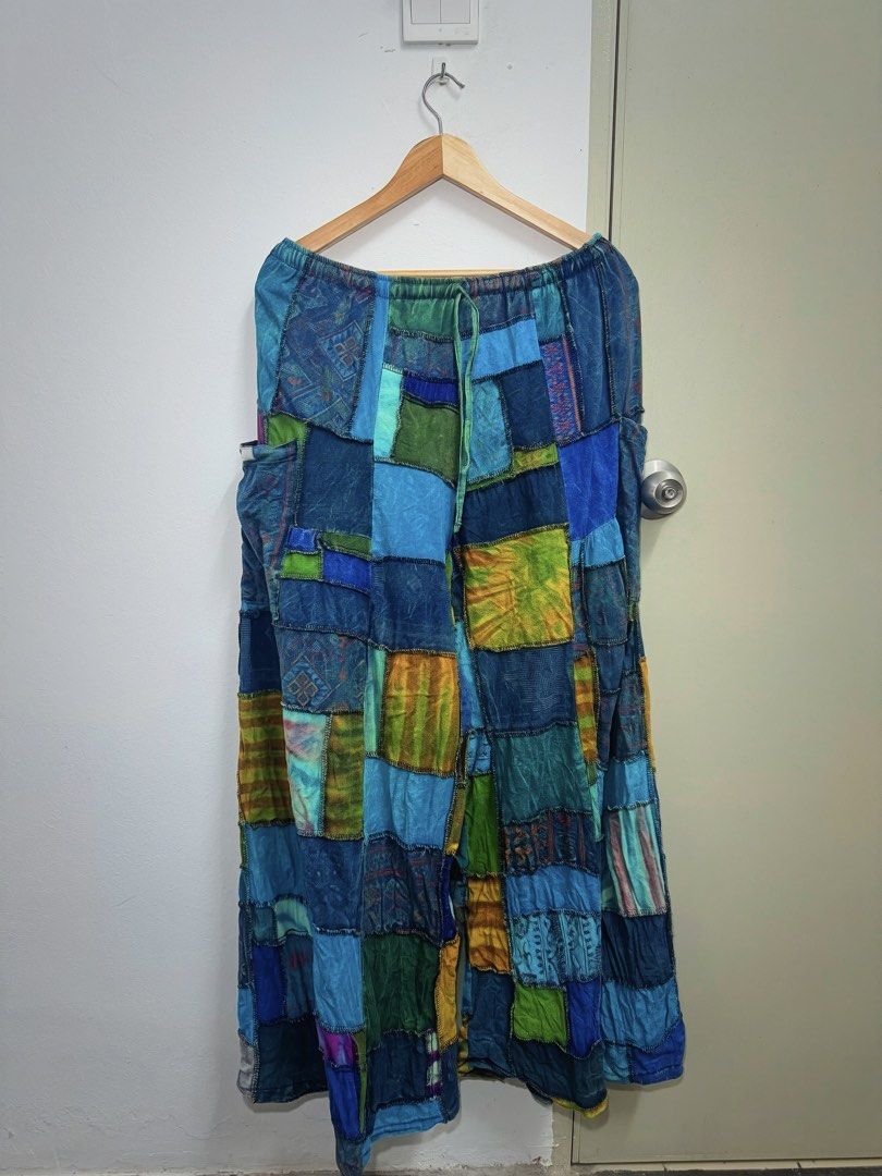 Hippie Workshop Patchwork Pants (Category: Skirts) located in Kuala Lumpur. Submitted by lubukrezeki_ (Listing ID 1445636627, Image 1). Description: - Patchwork Pants from Hippie Workshop. - Unique mix of blues, greens, purples, and red fabric accents. (Ocean Lover) - Features convenient front pockets. - Ideal for festival vibes or everyday casual style. -Fit to S to 2XL (Free Size).