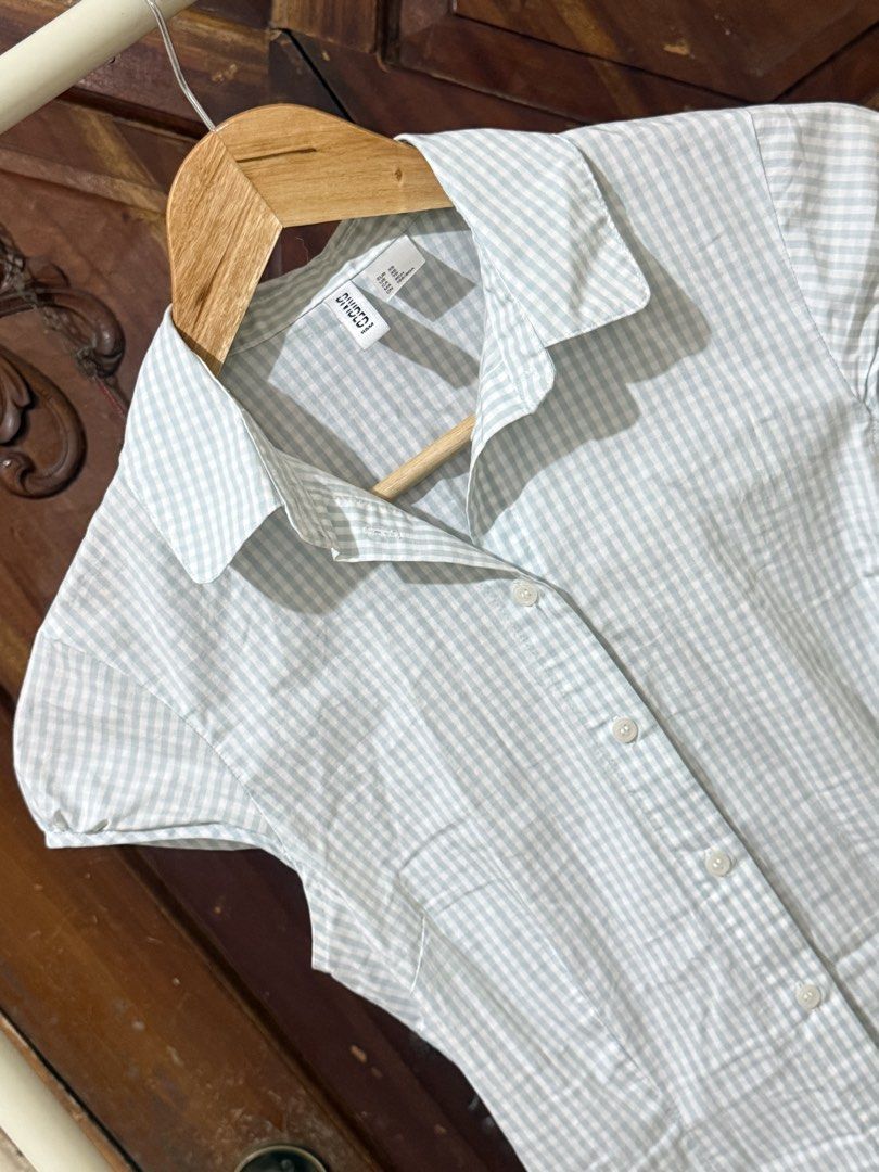 H&M Gingham Check Shirt Dress (Category: Dresses) located in Iloilo. Submitted by wornwellco (Listing ID 1445687937, Image 2). Description: - Cute gingham check shirt dress from H&M - Short sleeves and collared neckline - Button-up front - Light and breathable fabric - Versatile for casual or dressed-up occasions.