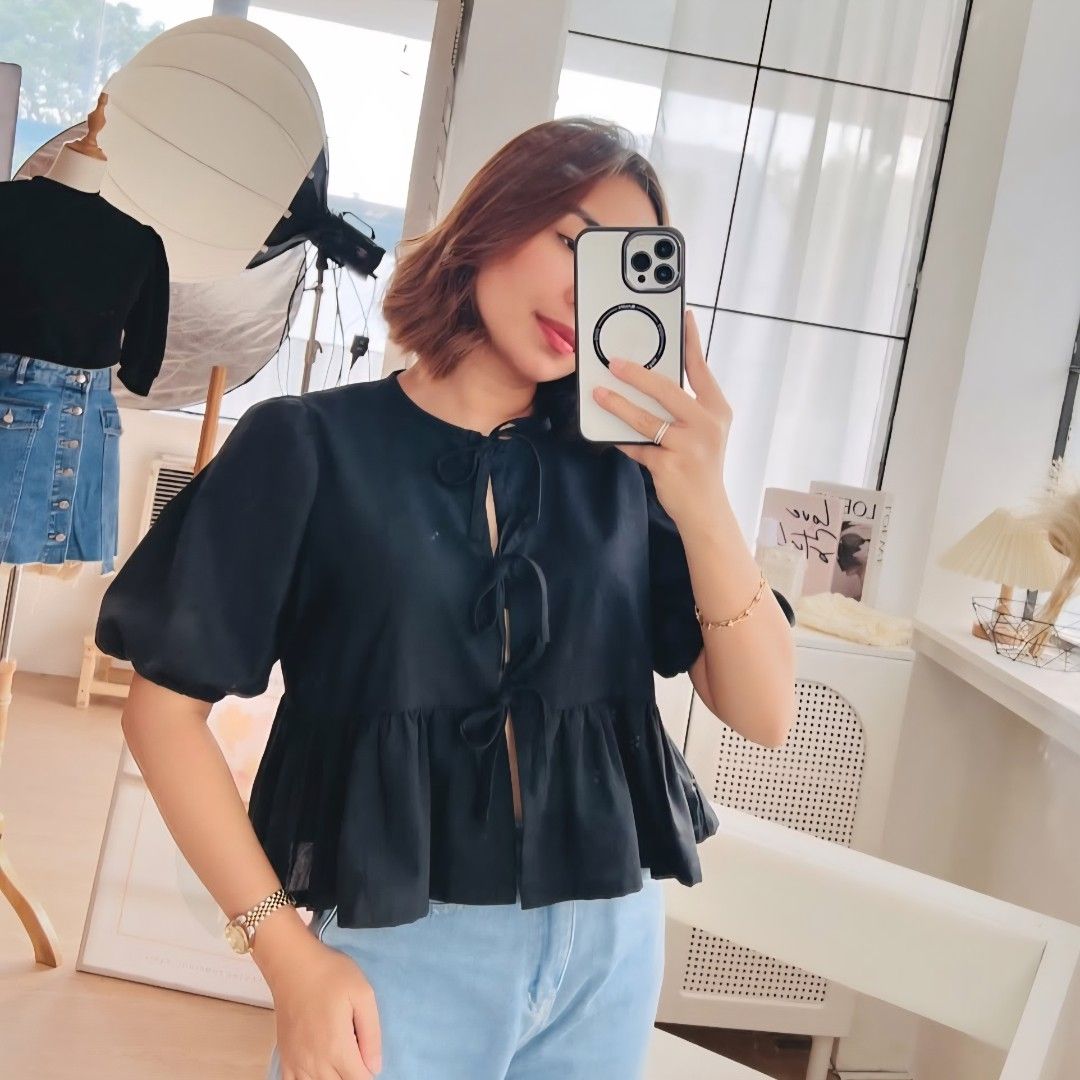 HTP Black Peplum Tie-Front Puff Sleeve Top (Category: Blouses) located in Urdaneta. Submitted by kcasi (Listing ID 1445724423, Image 1). Description: HTP brand from IG XL on tag Like new, barely used First photo grabbed from HTP instagram acct. Actual when worn in the last photo. *White color is sold already*.