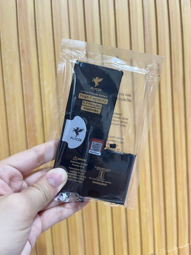 iPhone 11 Pro Max High Capacity Battery 4500 mAh Original Flycdi (Category: Batteries & Power Banks) located in Rizal. Submitted by chezcaaphrodite (Listing ID 1445699512, Image 2). Description: iPhone 11 Pro Max High Capacity Battery 4500 mAh Original Flycdi RFS: used temporarily, my phone is now replaced with original apple battery used for: 3 months only as temporary battery Original price: 1,200 complete parts, no damage, no issue.