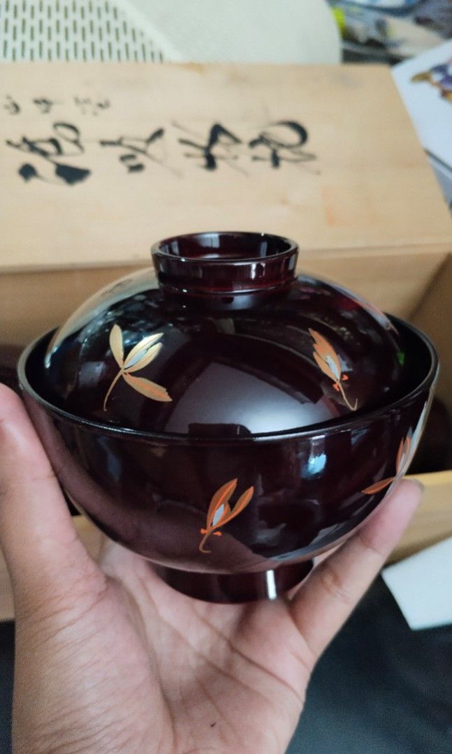 Japanese Lacquer Soup Bowls with Lids Set (Category: Dinnerware & Cutlery) located in Paranaque City. Submitted by jes_sy012 (Listing ID 1445646838, Image 3). Description: - Beautiful set of Japanese lacquer soup bowls -5Pcs Set - Dark brown with a delicate leaf design - Includes matching lids - Comes in original wooden box - Great for serving soup or rice - Perfect for a traditional dining experience - Stored carefully.