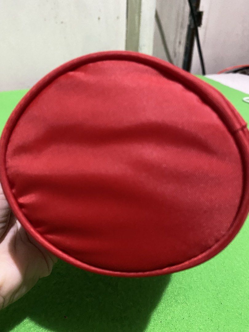 KFC Fried Chicken Red Pouch Bag with Colonel Sanders (Category: Purses & Pouches) located in Manila. Submitted by resi.diaz (Listing ID 1445777539, Image 3). Description: - Red pouch bag from Kentucky Fried Chicken. - Features the iconic Colonel Sanders mascot in a baseball uniform. - Includes a strap with 'KENTUCKY FRIED CHICKEN' printed on it. - Ideal for carrying small essentials. - A must-have for collectors and KFC fans!.