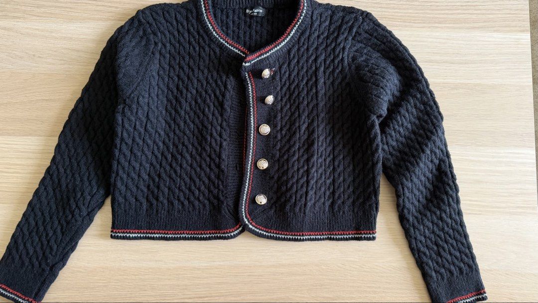 Knitted cardigan black (Category: Coats, Jackets and Outerwear) located in Makati City. Submitted by declutterwithella (Listing ID 1445612148, Image 1). Description: Brand: Riya Fashion from TikTok Size: Free size but best fits XS Color: Black with red and white lining.
