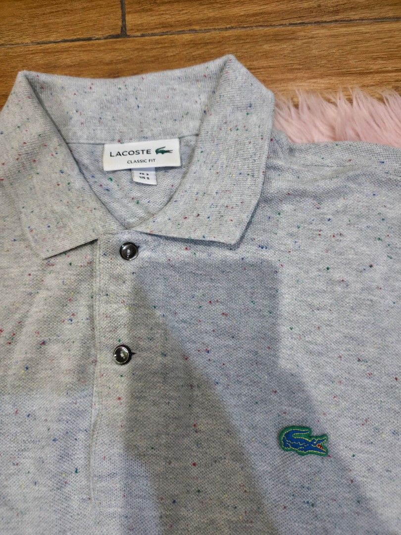 Lacoste speckled polo shirt grey (Category: Tshirts & Polo Shirts ) located in Manila. Submitted by machoxmatt (Listing ID 1445740317, Image 2). Description: used 1x size: 3 classic fit dimension: w19, L28 mop:bdo/gcash shipping at buyer's expense.