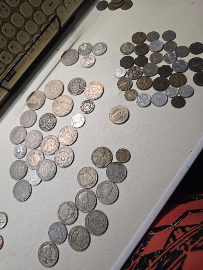Leftover Coins and Old Coins (Category: Currency) located in San Pedro. Submitted by grennybellz (Listing ID 1445743489, Image 2). Description: Selling old coins ans leftover coins from my travels Philippine Peso Taiwan Malaysia USD Take all - 1000.
