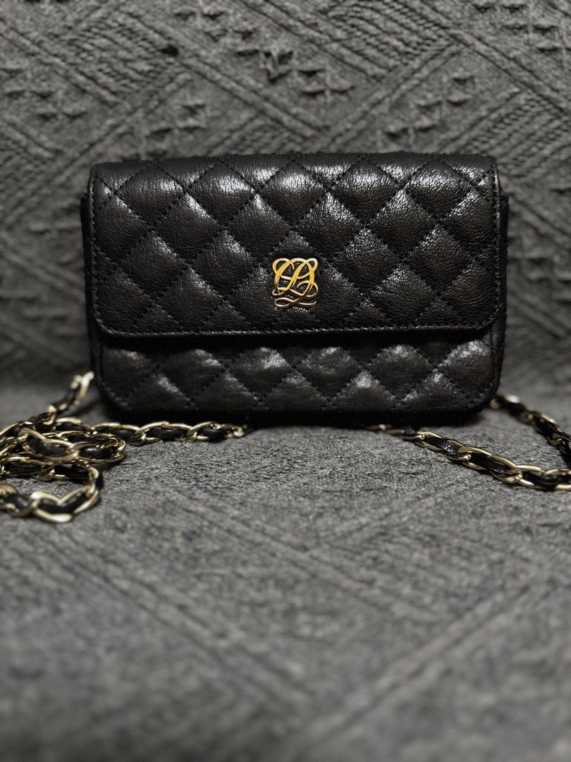 Louis Quatorze Quilted Mini Sling Bag | Phone Bag | Phone Sling (Category: Cross-body Bags) located in Agno. Submitted by ursecondhand_chic (Listing ID 1445717102, Image 1). Description: Original Louis Quatorze Mini Sling Bag •Kasya Iphone Pro Series plus card holder •Best for events •True Color: Dark Gray paired with Gold Hardwares •No hairlines sa logo and very pretty in person •Genuine Leather 100% RFS: Decluttering.