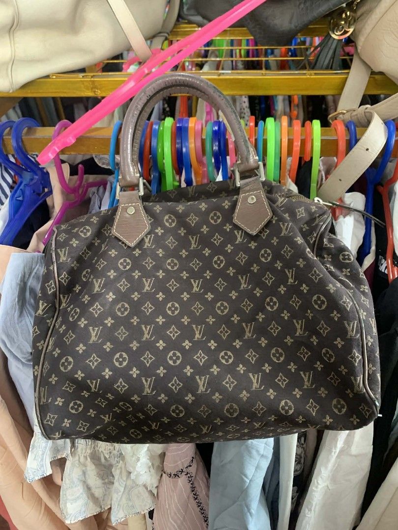 Louis Vuitton Monogram Speedy Bag (Category: Luxury Bags & Wallets) located in Manila. Submitted by gentlemountain.32545c (Listing ID 1445741588, Image 1). Description: - Classic Louis Vuitton Speedy bag - Monogram canvas with leather trim and handles - Zipper closure with original padlock and key included - Minor signs of wear on zipper and leather - A timeless and iconic piece.