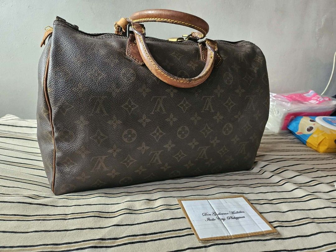 Louis Vuitton Speedy 35 LV Handbag (Category: Luxury Bags & Wallets) located in Iloilo. Submitted by ilonggawithheartfeltbeauty (Listing ID 1445694319, Image 2). Description: Speedy 35 13500 Legit / Authentic With Authentic Lock and Key and Lv Bag Tag Sign of usage sa canvas monogram but soft and no crack canvas. Pued pa gamitin. Puede ipa-cav. What you see is what you get. Please check all photos i usually post mostly the issues of the bag super