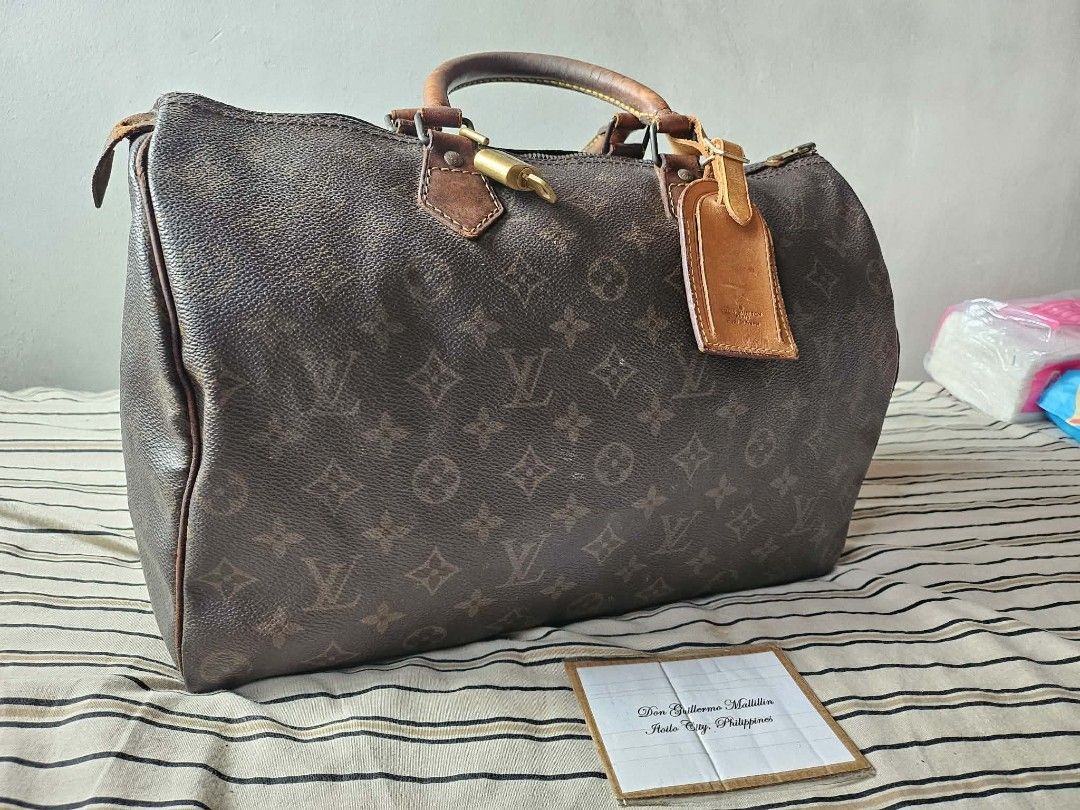 Louis Vuitton Speedy 35 LV Handbag (Category: Luxury Bags & Wallets) located in Iloilo. Submitted by ilonggawithheartfeltbeauty (Listing ID 1445694319, Image 1). Description: Speedy 35 13500 Legit / Authentic With Authentic Lock and Key and Lv Bag Tag Sign of usage sa canvas monogram but soft and no crack canvas. Pued pa gamitin. Puede ipa-cav. What you see is what you get. Please check all photos i usually post mostly the issues of the bag super