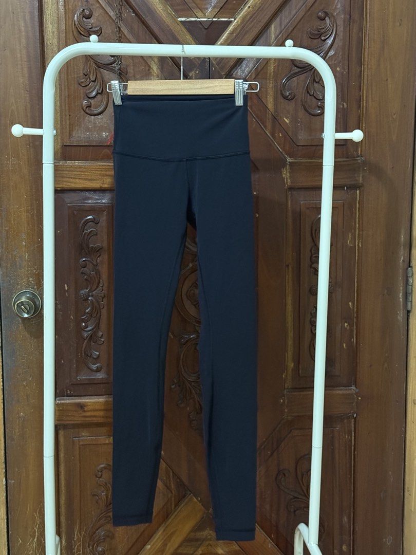 Lululemon Black High-Waisted Leggings (Category: Activewear) located in Iloilo. Submitted by wornwellco (Listing ID 1445687480, Image 3). Description: - Black Lululemon leggings - High-waisted fit - Soft and stretchy material - Comfortable for workouts and everyday wear - Iconic Lululemon logo on back waistband - Ideal for an active lifestyle.