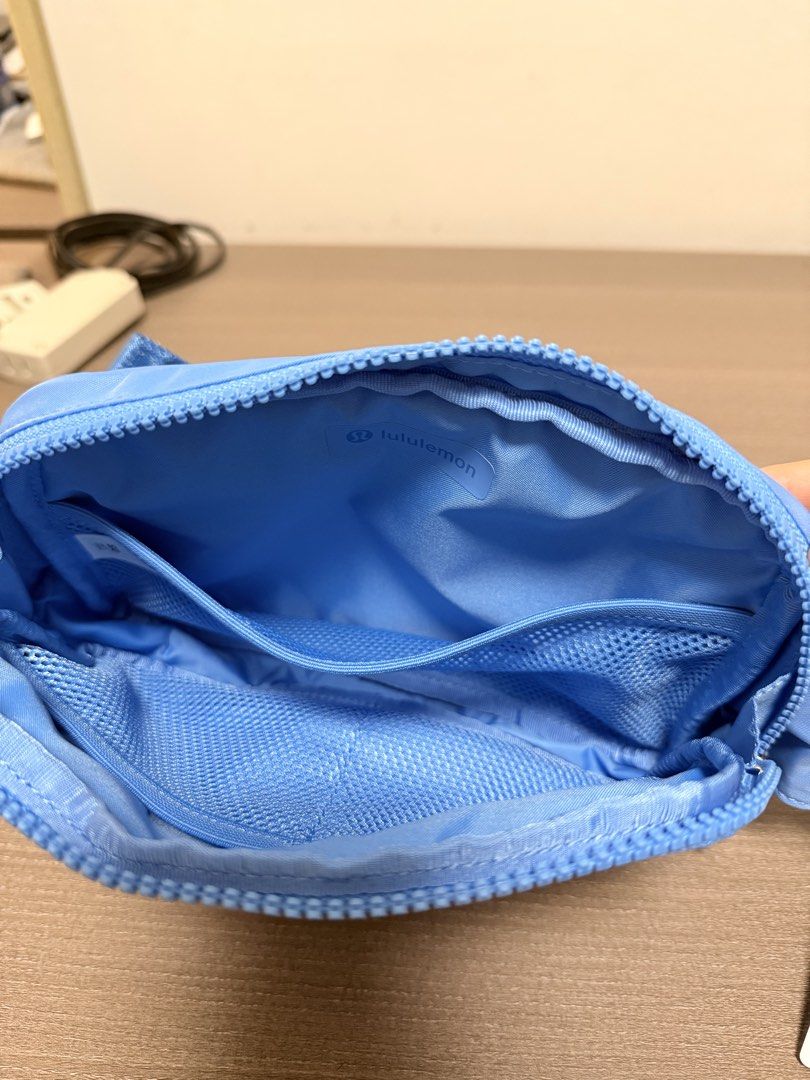 Lululemon Everywhere Belt Bag 2L (Large) (Category: Cross-body Bags) located in San Pedro. Submitted by cheetos.potato (Listing ID 1445720556, Image 2). Description: - Original Price: $48 (₱2,943) - Main zippered compartment - Interior mesh pocket - Adjustable strap with buckle closure - Ideal for everyday use or travel - Comes with original tags.