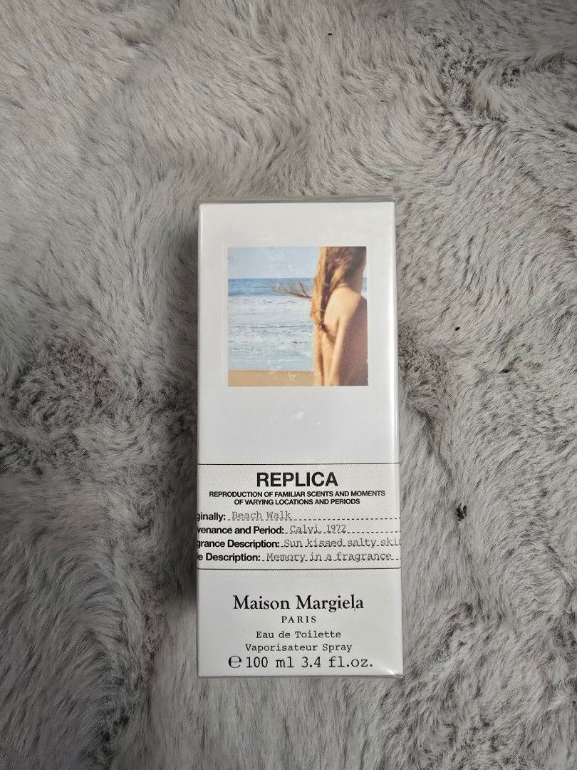 Maison Margiela Replica Eau de Toilette 100ml (Category: Fragrance & Deodorants) located in Quezon City. Submitted by iammjdlb (Listing ID 1445746341, Image 1). Description: - Maison Margiela Replica Eau de Toilette - Scent: 'Beach Walk'' - Size: 100ml bottle - Type: Vaporisateur spray - Condition: Brand new, sealed in original packaging - Ideal for: Gifting or personal collection.