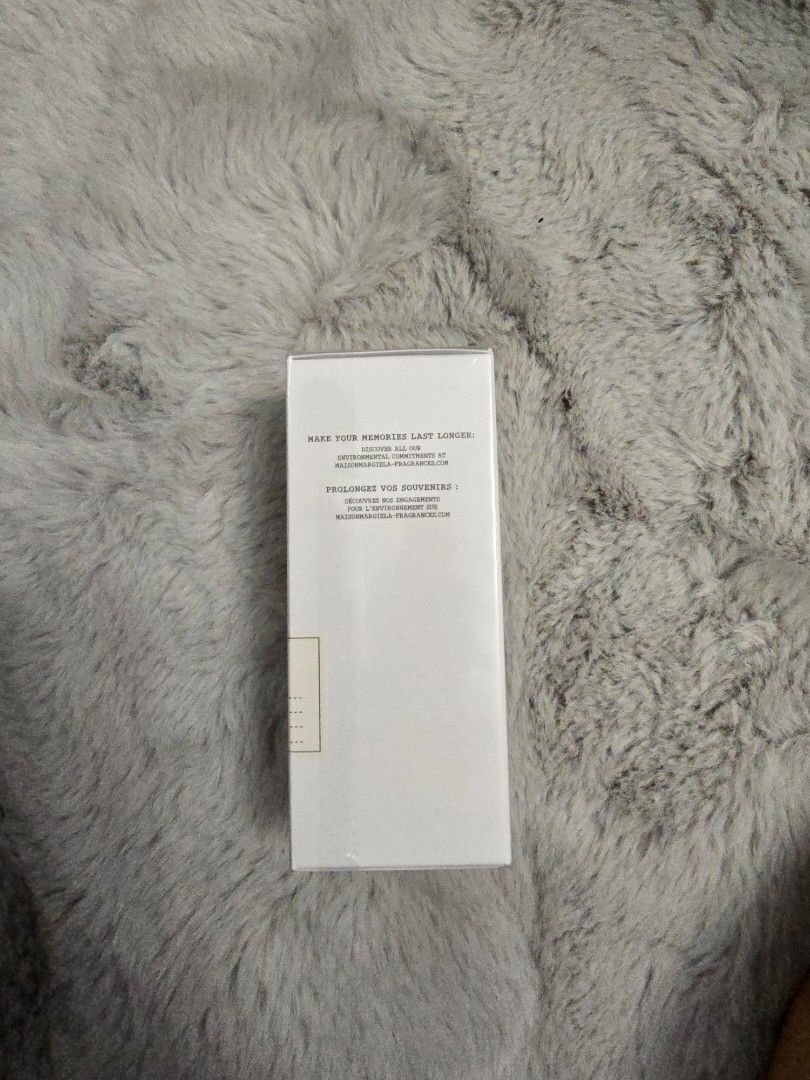 Maison Margiela Replica Eau de Toilette 100ml (Category: Fragrance & Deodorants) located in Quezon City. Submitted by iammjdlb (Listing ID 1445746663, Image 2). Description: - Maison Margiela Replica Eau de Toilette - Scent: 'On A Date'' - Size: 100ml bottle - Key Notes: Grapes and Roses - Includes original packaging - Ideal for gifting or personal collection.
