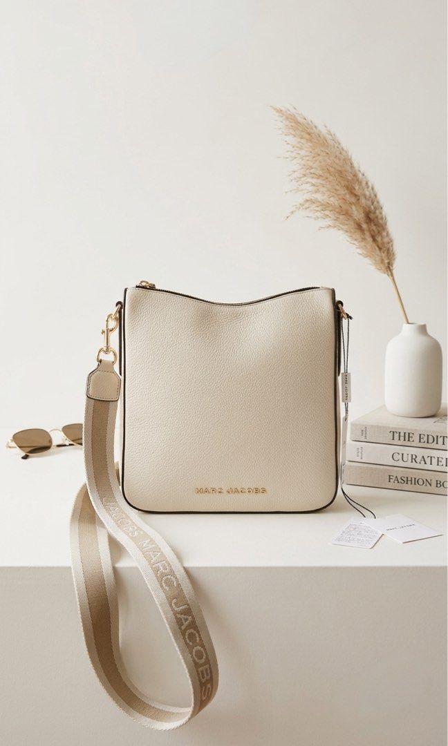 Marc Jacobs Drifter Crossbody Bag (Category: Luxury Bags & Wallets) located in Pasig City. Submitted by toryluxebags (Listing ID 1445786995, Image 2). Description: Marc Jacobs Drifter Crossbody Bag ✔️ Brand new ✔️ Comes with paper bag ✔️ 100% Authentic ✔️ Stylish and versatile crossbody bag for everyday use ₱10,500 .