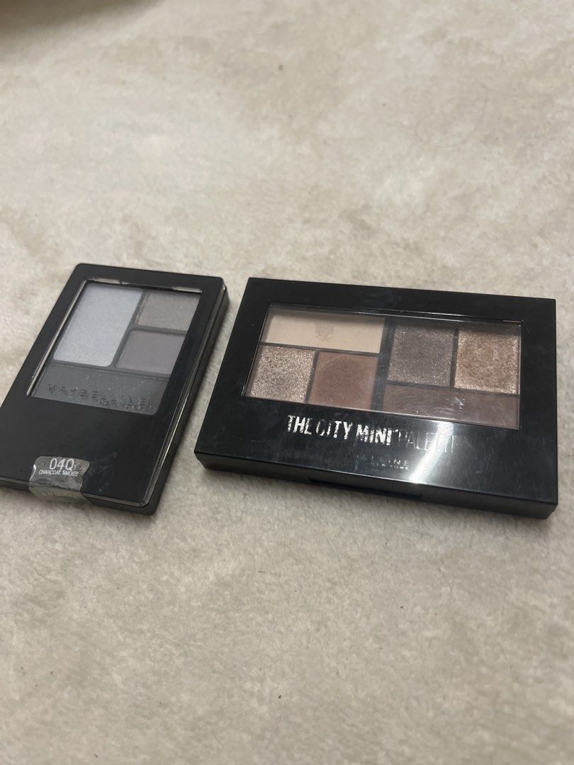 Maybelline Eyeshadow Palette (Sold as a Set) (Category: Makeup) located in Cagayan de Oro. Submitted by simplydecluttering_makeup (Listing ID 1445779497, Image 2). Description: I only used the palette with the browns and neutrals once. That’s it. Rfs: I don’t really use eyeshadows. Shipping from Cagayan de Oro via J&T. - Maybelline eyeshadow palette set - Includes two palettes - Features neutral, brown, and shimmery shades - One palette has grey 