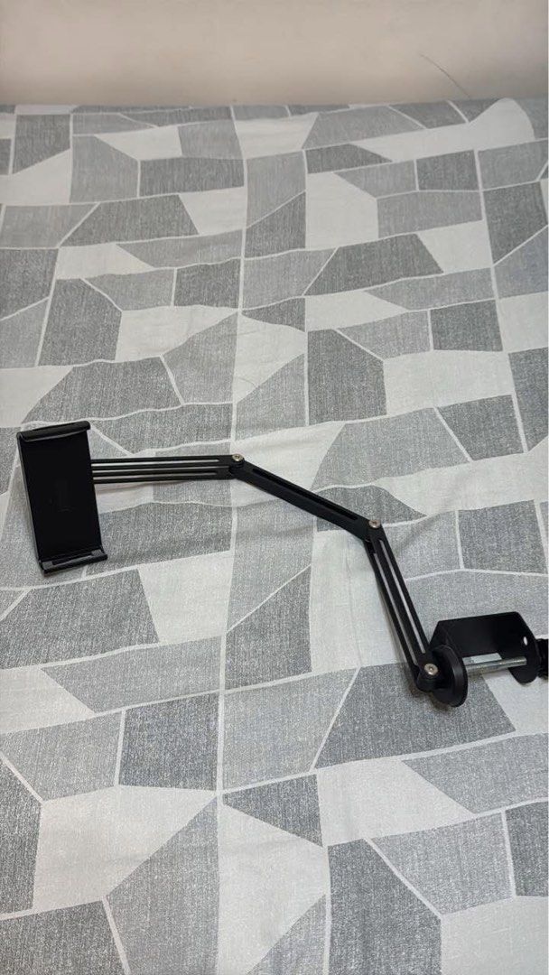 Meewoo Adjustable Tablet Phone Holder (Aluminum) (Category: Mounts & Holders) located in Manila. Submitted by justinbrj (Listing ID 1445711362, Image 1). Description: - Meewoo Tablet & Phone Stand - Adjustable and Telescopic - Aluminum - Ideal for iPads and Phones - Sturdy Clamp Base for Desks/Tables - 360-Degree Rotation for Perfect Viewing Angle RFS: Decluttering, nag moveout na sa dorm.