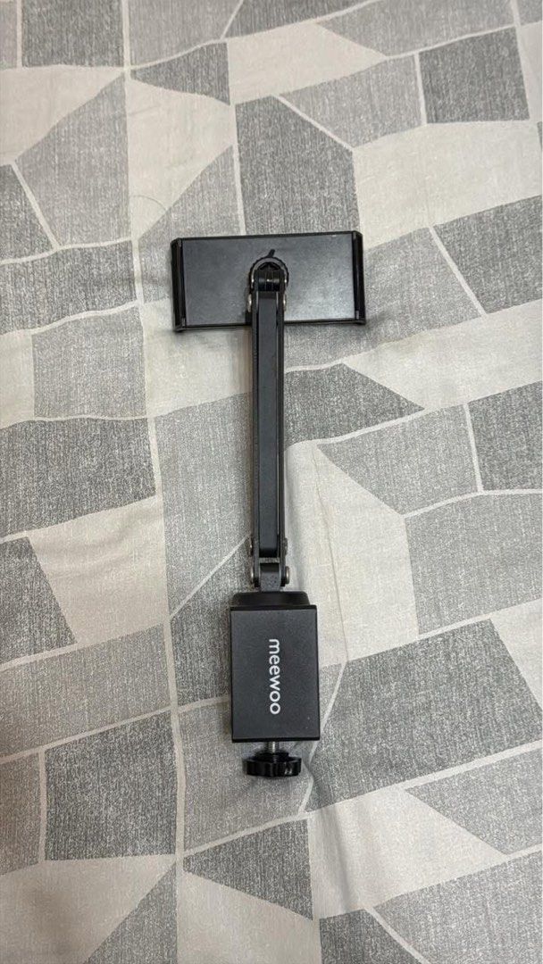 Meewoo Adjustable Tablet Phone Holder (Aluminum) (Category: Mounts & Holders) located in Manila. Submitted by justinbrj (Listing ID 1445711362, Image 2). Description: - Meewoo Tablet & Phone Stand - Adjustable and Telescopic - Aluminum - Ideal for iPads and Phones - Sturdy Clamp Base for Desks/Tables - 360-Degree Rotation for Perfect Viewing Angle RFS: Decluttering, nag moveout na sa dorm.
