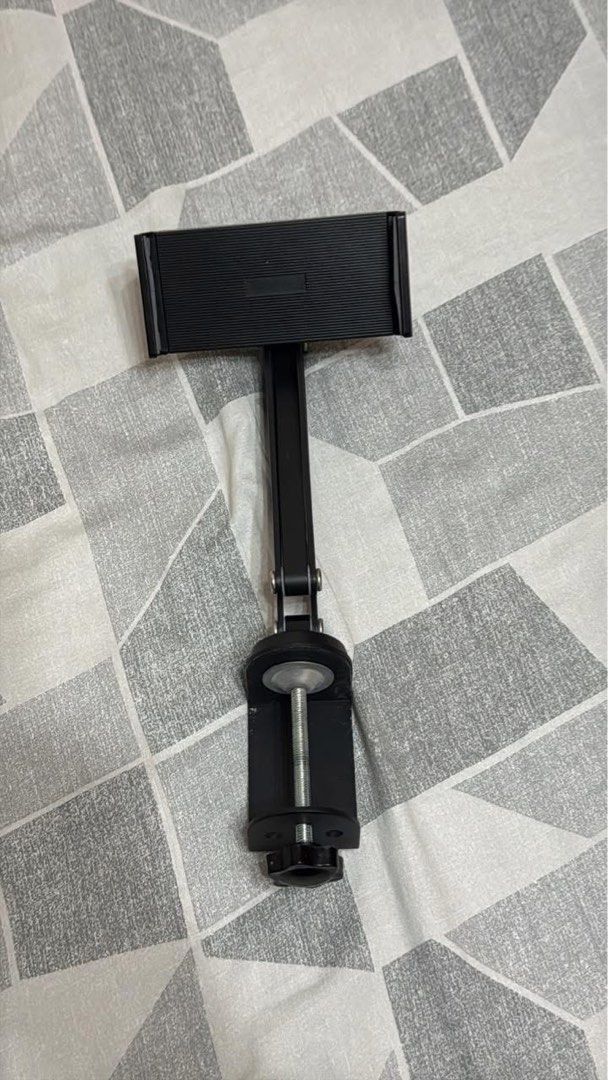 Meewoo Adjustable Tablet Phone Holder (Aluminum) (Category: Mounts & Holders) located in Manila. Submitted by justinbrj (Listing ID 1445711362, Image 3). Description: - Meewoo Tablet & Phone Stand - Adjustable and Telescopic - Aluminum - Ideal for iPads and Phones - Sturdy Clamp Base for Desks/Tables - 360-Degree Rotation for Perfect Viewing Angle RFS: Decluttering, nag moveout na sa dorm.