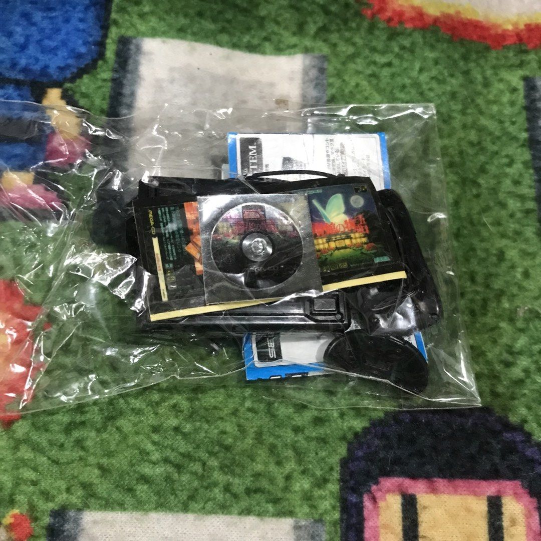 Mega CD - Sega History Collection Gashapon (Category: Vintage Collectibles) located in Rizal. Submitted by makoroku89 (Listing ID 1445674809, Image 1). Description: - Miniature Mega CD console made by Yujin Note: Please message me first before decide to purchase. .