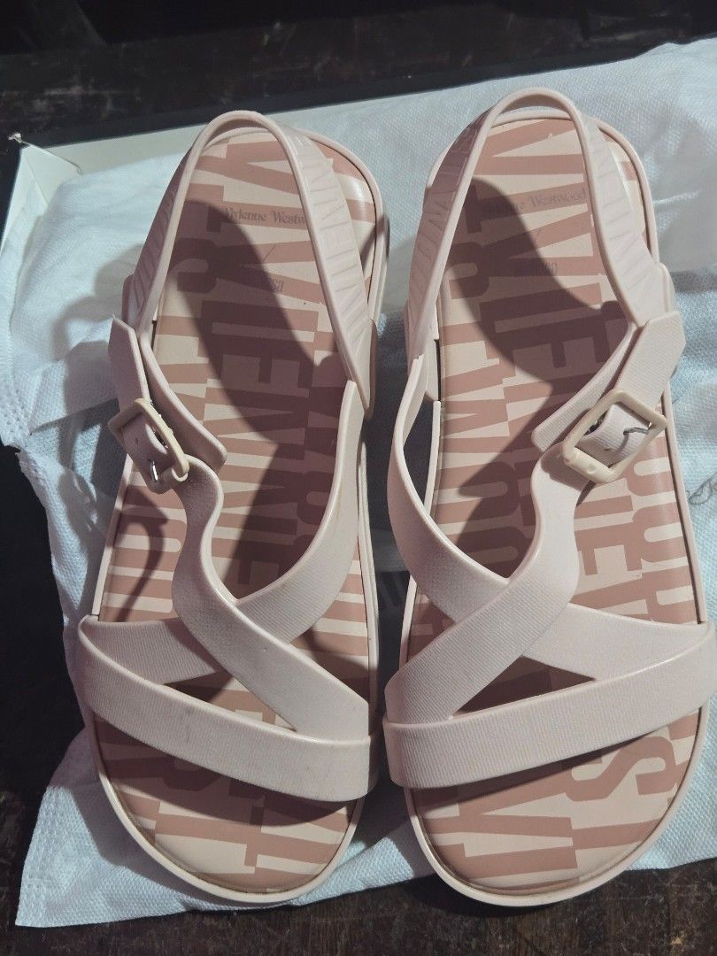 Melissa Pink Jelly Sandals Size 7 (Category: Flats & Sandals) located in Pasig City. Submitted by princesspow (Listing ID 1445679804, Image 1). Description: - Pink Melissa jelly sandals - Features Melissa logo all over the insoles - Strappy design with buckle closure - Made in Brazil - Ideal for beach days or casual wear.