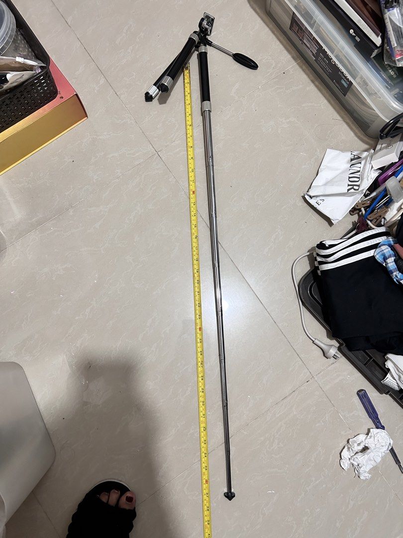 Mini Tripod with Extendable Legs (Category: Tripods & Monopods) located in Taguig. Submitted by Yanyann (Listing ID 1445748665, Image 3). Description: - Compact tripod, perfect for cameras or smartphones. - Extendable legs for adjustable height. - Features a pan head for easy camera positioning. - Small and portable, ideal for travel and everyday use. - Shows minor scuffs from normal use..