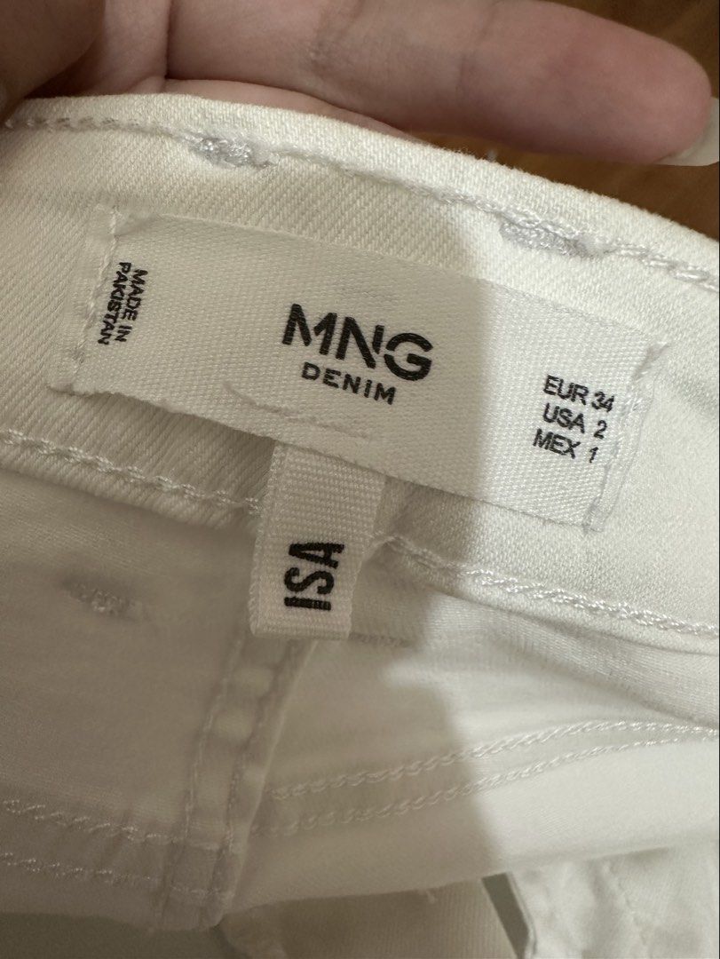 MNG Denim White Cropped Raw Hem Jeans (Category: Jeans) located in San Juan City. Submitted by nanahachis (Listing ID 1445756391, Image 3). Description: previous owner’s measurements ♡ bust: 36 in waist: 28 in hip: 35 in height: 4’11 / 150 cm feel free to send a message for more details / photos location: san juan city, metro manila mop: gcash mod: jnt or sdd shipping usually every wed & fri or when i have free time ! will let you know in advance