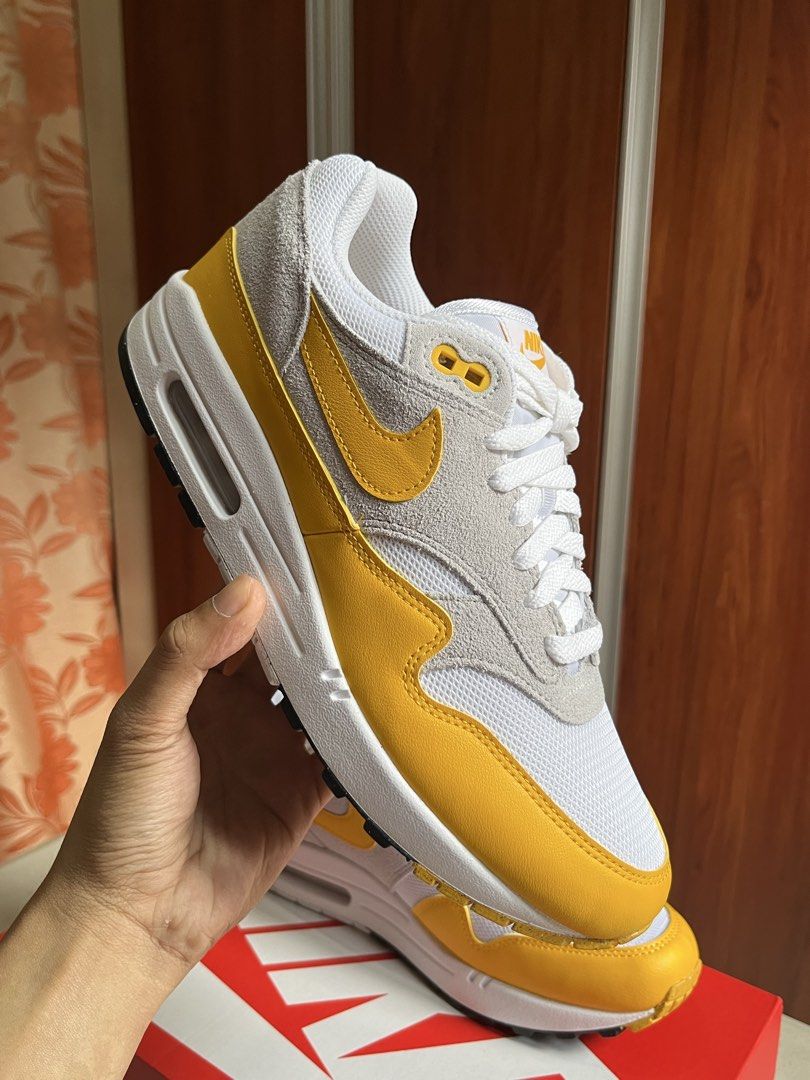 Nike Air Max 1 Essential University Gold (Category: Casual Shoes) located in Quezon City. Submitted by somebanothings (Listing ID 1445663409, Image 2). Description: Nike Air Max 1 Essential University Gold - new and unused, with box Size: 8USM 9.5USL 7UK 41EU Loc: Welcome Rotonda, Quezon City Price is fixed already. Not for swap..