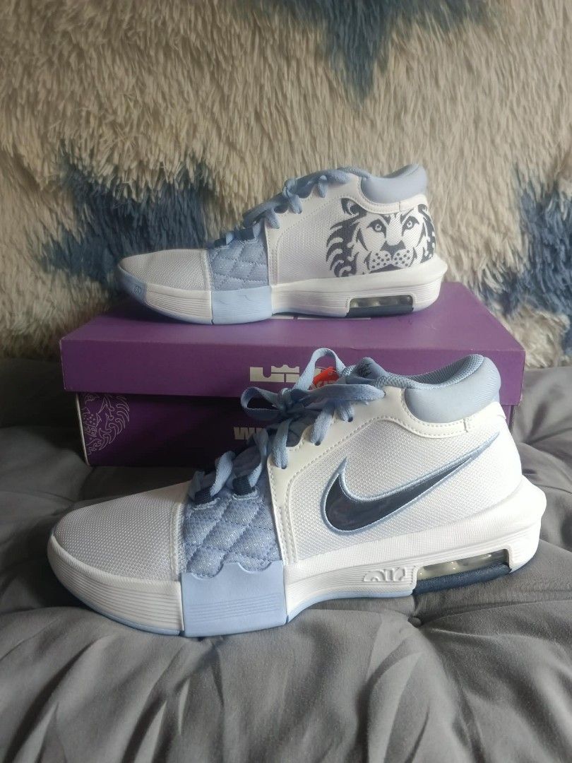 Nike LeBron Witness 8 (Category: Sneakers) located in Muntinlupa City. Submitted by marim45981 (Listing ID 1445609465, Image 2). Description: - Nike LeBron Witness 8 XDR basketball shoes - Special "Year of the Tiger" theme with unique tiger graphics - Stylish white and light blue colorway - Features XDR outsole for enhanced durability on the court - Includes original box - Ideal for basketball players - 💯 authentic.