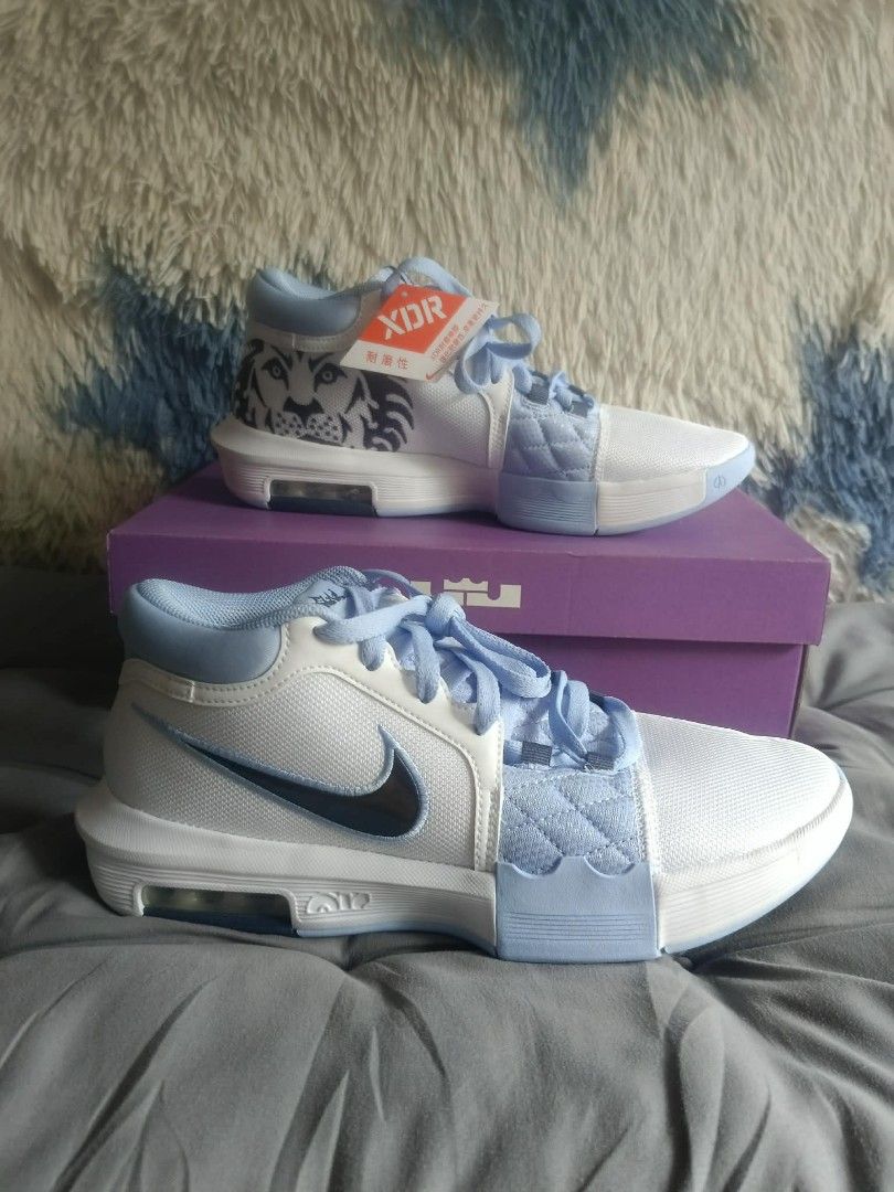 Nike LeBron Witness 8 (Category: Sneakers) located in Muntinlupa City. Submitted by marim45981 (Listing ID 1445609465, Image 3). Description: - Nike LeBron Witness 8 XDR basketball shoes - Special "Year of the Tiger" theme with unique tiger graphics - Stylish white and light blue colorway - Features XDR outsole for enhanced durability on the court - Includes original box - Ideal for basketball players - 💯 authentic.