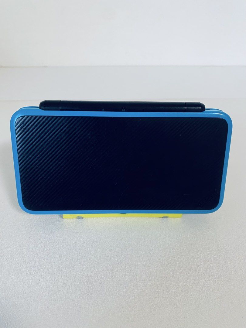 Nintendo 2DS XL Blue/Black - Includes Charger (Category: Nintendo) located in Caloocan City. Submitted by rjane1204 (Listing ID 1445623643, Image 3). Description: - Nintendo 2DS XL (Blue/Black) - Clean screens, no scratches - All buttons and joystick fully functional - Includes USB charging cable - Perfect for portable gaming on the go.