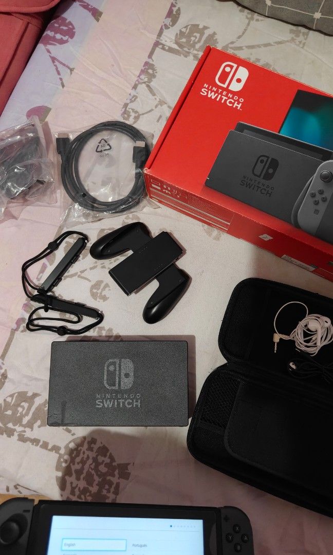 Nintendo Switch V2 (w/ box) and accessories (Category: Nintendo) located in General Trias. Submitted by mijuur (Listing ID 1445611058, Image 3). Description: LADY OWNED! COMPLETE ACCESSORIES! WITH FREEBIES! Bought in 2022 LCD repaired in 2024 No SD Card RFS: Upgrading - Nintendo Switch Console - Includes Dock - Comes with Joy-Cons - All Necessary Cables Present - Ready for Immediate Gaming - Feel free to ask any questions!.