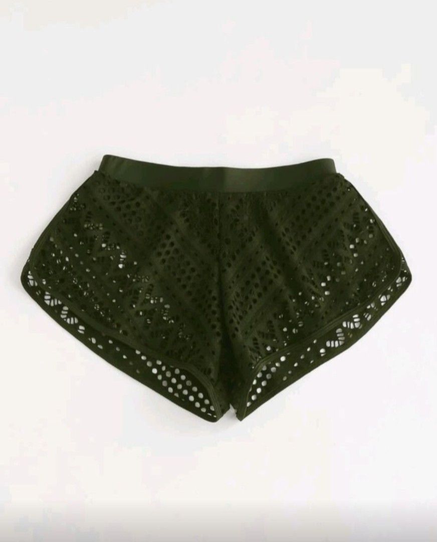 Olive green crochet short (Category: Shorts) located in Manila. Submitted by red_06 (Listing ID 1445663432, Image 3). Description: - Olive green crochet shorts - Comfortable elastic waistband - Delicate openwork design - Lightweight material - Relaxed fit - Perfect for beach cover-ups or layering - Versatile for summer wardrobe.