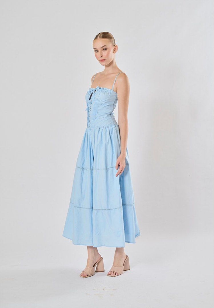XS-S Olivette Blue Button Down Ruched Bust Square Neck Tiered Midi Dress (Category: Dresses) located in Dinalupihan. Submitted by fashionboxa (Listing ID 1445762104, Image 3). Description: Comparable Value P1,740 Selling low to DECLUTTER Never used Product Details: Regular Fit, Solid Tone, Polyester Garment Measurements Small - Bust: 78cm, Waist: 68cm, Length: 65cm Model wear Small.