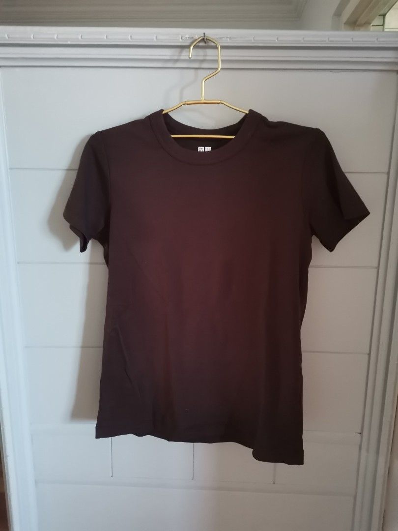 uniqlo shirt (Category: Shirts) located in Quezon City. Submitted by charlottescollection (Listing ID 1445627197, Image 1). Description: original uniqlo shirt brown color washed and never used .