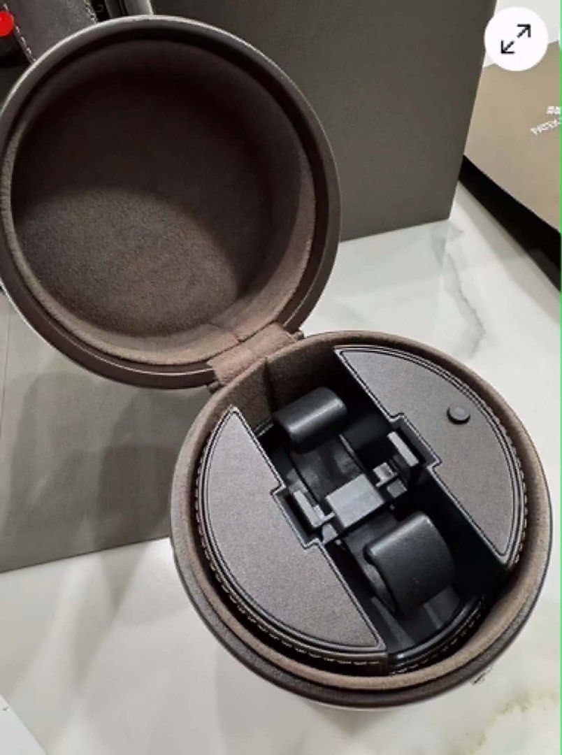 Patek Philippe Geneve Watch winder (Category: Luxury Watches) located in Pasig City. Submitted by Watchaholics (Listing ID 1445751158, Image 2). Description: - Original Patek Philippe watch winder - Includes outer box and documentation - Made of dark brown leather with white stitching - watch winder - Comes with original Packing.