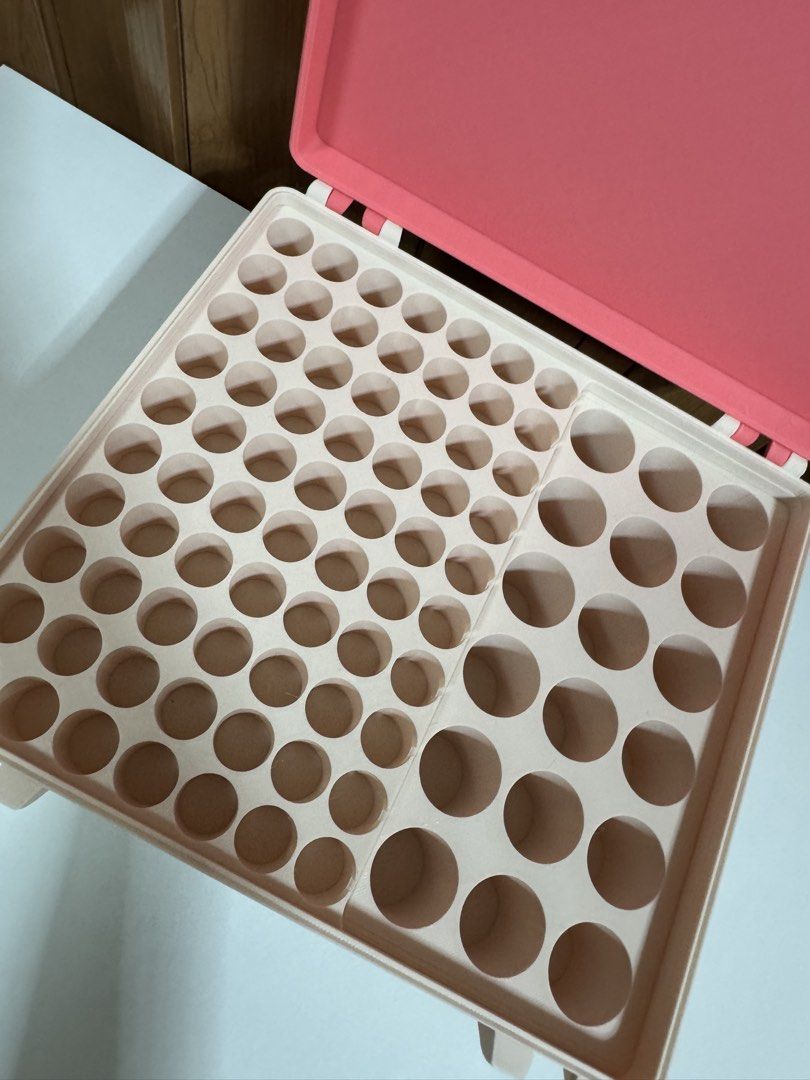 Peptide organizer/box 70 slots (3ml) 18 slots (10ml) (Category: Storage Boxes & Baskets) located in Makati City. Submitted by everything.peachy (Listing ID 1445692783, Image 2). Description: - Handy storage case with dual-sided compartments for 3ml and 10ml vials - Bright pink lid with secure purple clasps. Can customize colors - Perfect for organizing vials On-hand & pre-order ( for customized colors).