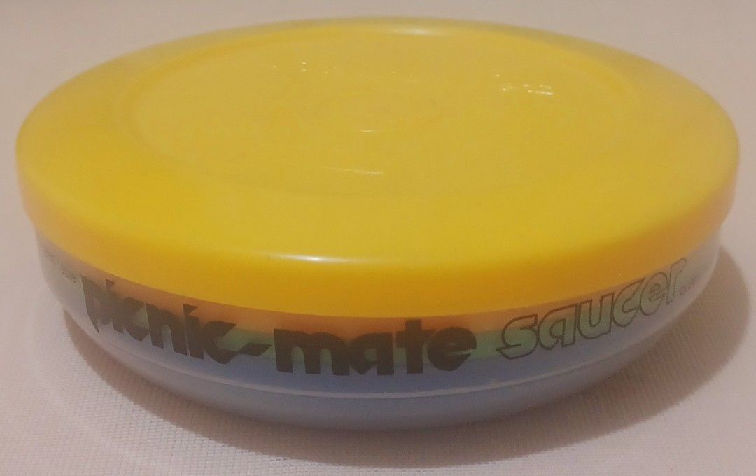 Perma‑Ware Picnic‑Mate Saucer Set — COMPLETE 4‑Color Stackable Set | Made in PH (Category: Food Organization & Storage) located in Quezon City. Submitted by wjmae (Listing ID 1445640701, Image 1). Description: ✨ Authentic classic Perma‑Ware picnic ware — fully intact, complete set! 🥗 What you get: • Clear storage base + secure yellow snap‑lid • 4 colorful saucers: bright green, sunny yellow, bold red, vivid blue — all nest neatly inside 📏 Size: