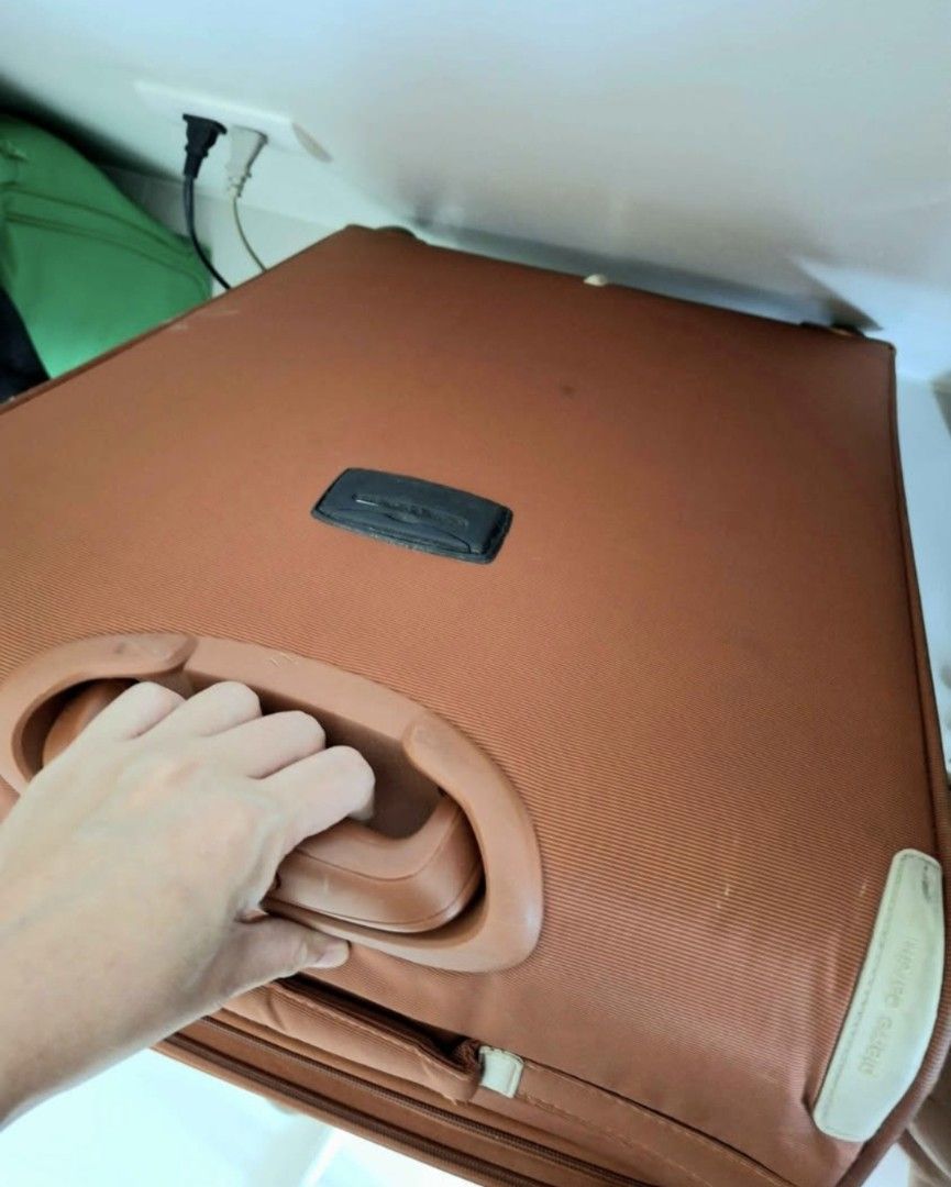 Pierre Cardin Orange Softside Luggage Suitcase (Category: Luggage) located in Manila. Submitted by selling_preloved_items1122 (Listing ID 1445636754, Image 3). Description: - Orange Pierre Cardin luggage - Durable textured weave fabric - Convenient top and side handles for easy carrying - Ample interior space for all your travel essentials - Perfect for your next adventure!.