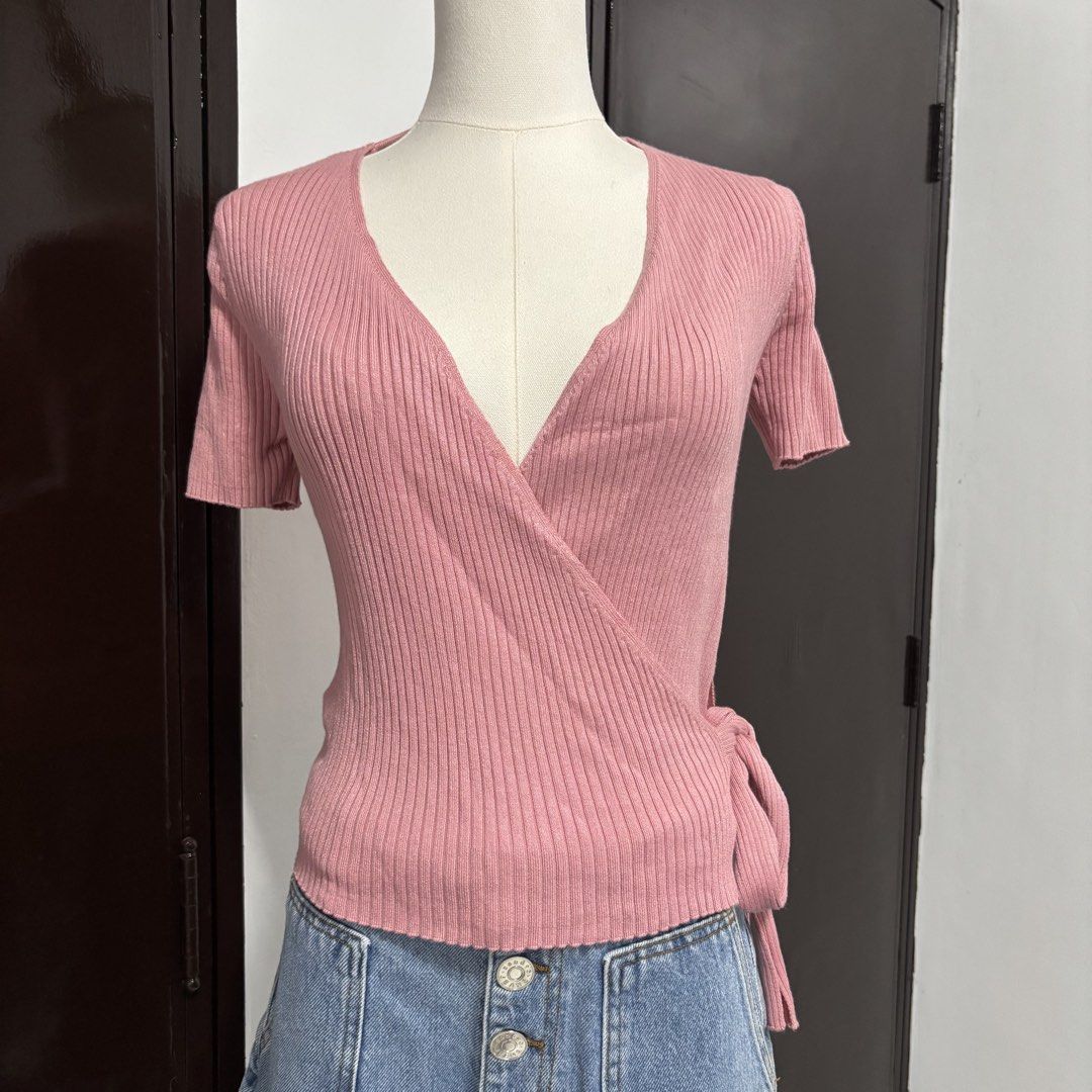 Pink Ribbed Knit Short Sleeve Wrap Top (Category: Blouses) located in Pasay City. Submitted by offtherack.ph (Listing ID 1445669811, Image 2). Description: - Cute pink wrap top - Short sleeves - Ribbed knit material - Side tie closure - Flattering and versatile design - Easy to style for casual or dressy occasions - Perfect for everyday wear - stretchy, can fit S-M.
