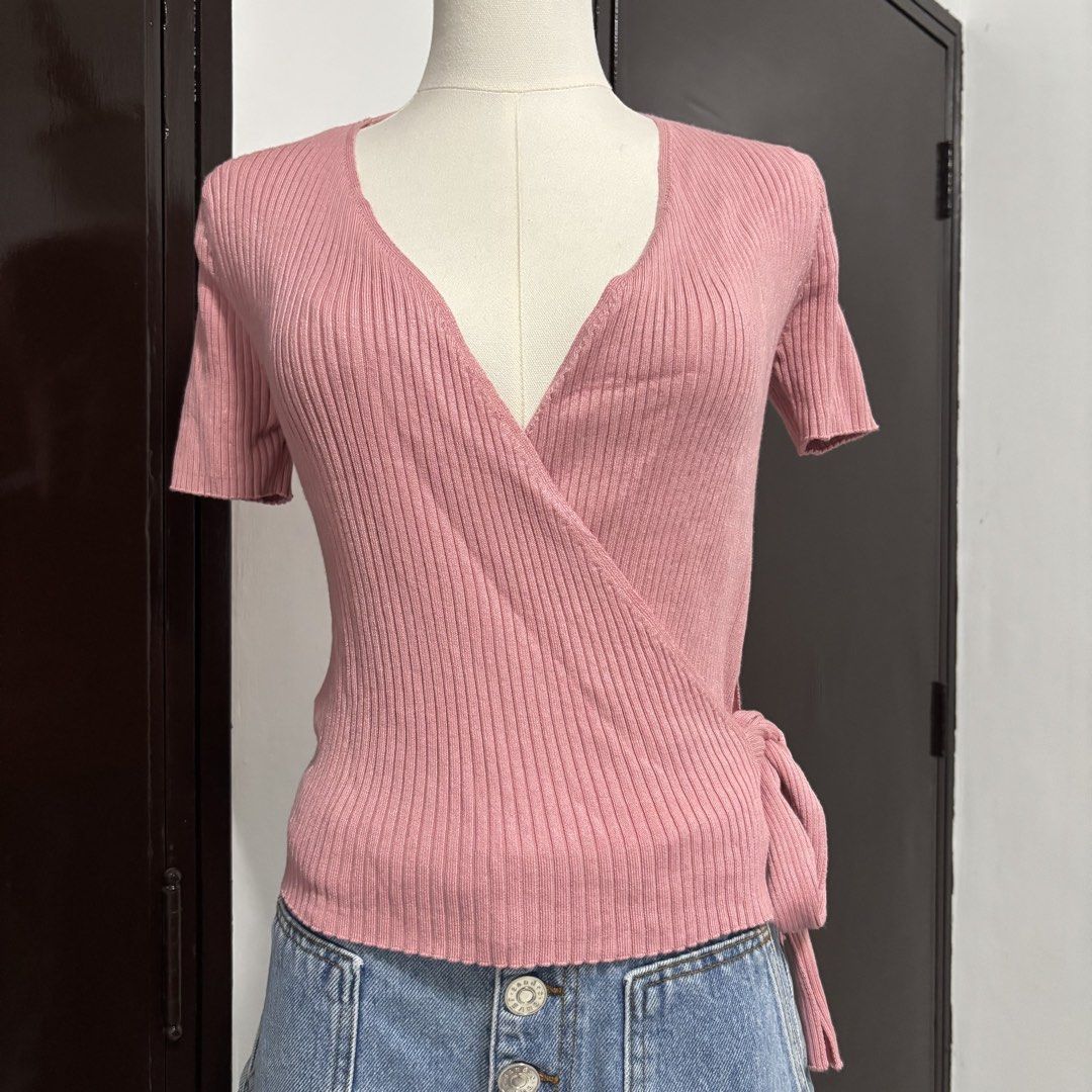 Pink Ribbed Knit Short Sleeve Wrap Top (Category: Blouses) located in Pasay City. Submitted by offtherack.ph (Listing ID 1445669811, Image 1). Description: - Cute pink wrap top - Short sleeves - Ribbed knit material - Side tie closure - Flattering and versatile design - Easy to style for casual or dressy occasions - Perfect for everyday wear - stretchy, can fit S-M.