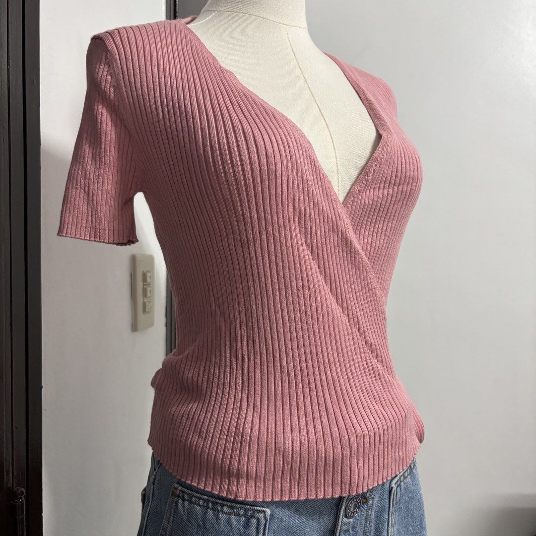 Pink Ribbed Knit Short Sleeve Wrap Top (Category: Blouses) located in Pasay City. Submitted by offtherack.ph (Listing ID 1445669811, Image 3). Description: - Cute pink wrap top - Short sleeves - Ribbed knit material - Side tie closure - Flattering and versatile design - Easy to style for casual or dressy occasions - Perfect for everyday wear - stretchy, can fit S-M.