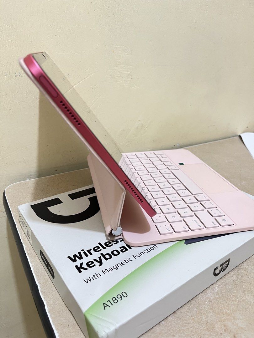 Pink Wireless Keyboard Case with Magnetic Function for Tablet (Category: Computer Keyboard) located in Taguig. Submitted by milllooo (Listing ID 1445747998, Image 2). Description: Take all for 2,500 Both brand: GOOJODOQ Original price 3,500 for case and HDMI/USB - Pink wireless keyboard case (Magnetic function) iPad 11th gen - 5in1 USB/HDMI hub (bnew, natapon na box) - box included for case -with free clear case for ipad 11th gen IPAD NOT INCLUDE