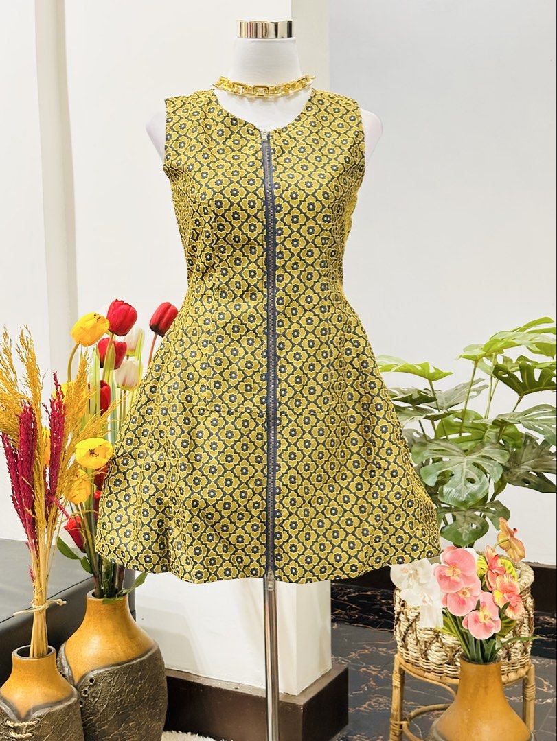 Prada Milano A-Line Dress (Category: Dresses) located in Bugallon. Submitted by itskierbrielle (Listing ID 1445720418, Image 1). Description: - Size Small-Medium - Prada Milano sleeveless A-line dress - Yellow and navy floral jacquard pattern - Zipper closure down the front - Fully lined in navy blue - Perfect for a statement look AUTHENTICATION NOT GUARANTEED. Mine at your own risk ⚠️🌸 .